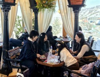 Customers enjoy coffee and their leisure time at a cafe in Baiyanggou Village in Urumqi County, northwest China's Xinjiang Uygur Autonomous Region, March 15, 2025. (Xinhua/He Xiaotong)