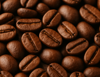 Close-up of medium to dark roasted coffee beans with dry, oil-free surfaces, showing quality texture and freshness