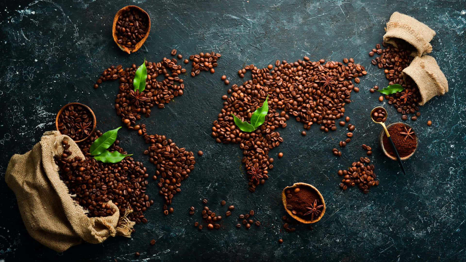 World map made from roasted coffee beans on a dark textured surface, symbolizing the global coffee trade and market connections.
