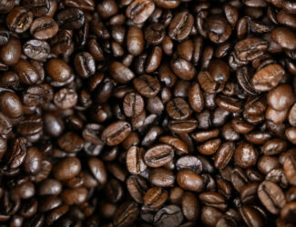 Coffee beans and export sacks symbolizing global market shifts during U.S.–Brazil trade talks in 2025.