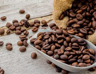 Dry coffee plantation in Brazil affected by heat and drought, highlighting rising global coffee prices in 2025.
