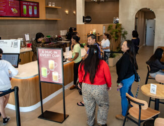 Customers order at Da Vien Coffee, in Long Beach on Wednesday, Nov. 26, 2025.