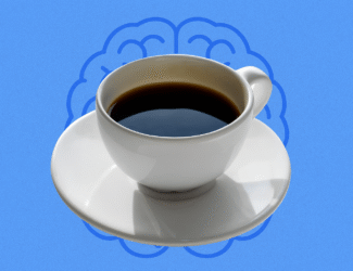White coffee cup on a saucer over a blue background with a brain outline, symbolizing caffeine’s effect on mental activity.